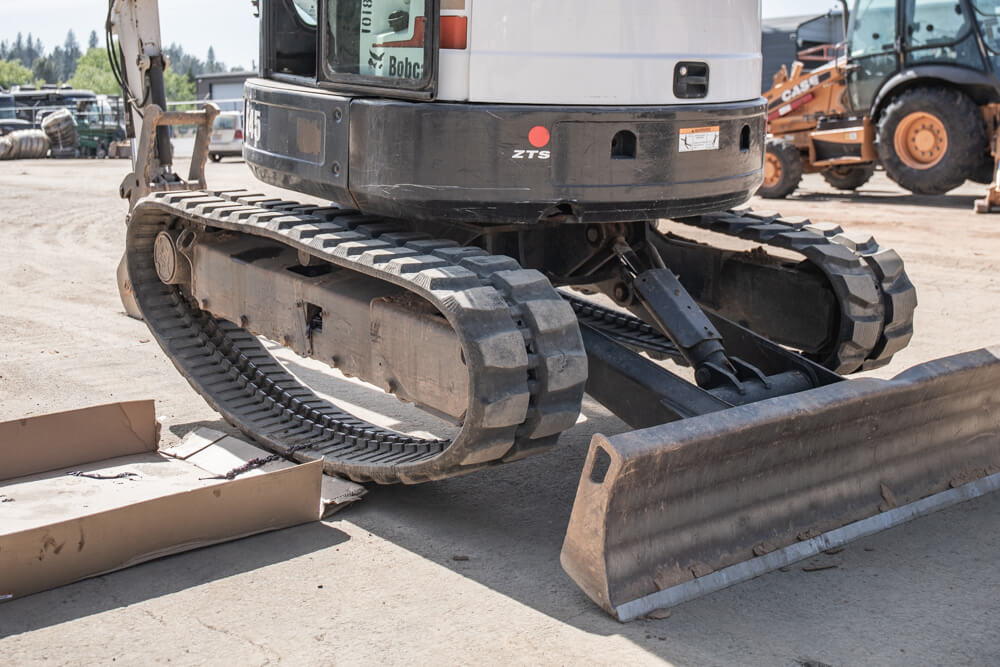 Step 4A: Using Bobcat Blade & Boom - Lift the unit off the Ground